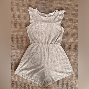 #160 Women’s Caution To The Wind romper in light gray/Black in Size Medium.
